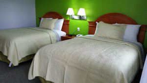 Nipissing Inn in North Bay, image may contain: Bed, Furniture, Linen, Home Decor
