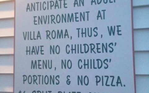 Fair warning at the door of Villa Roma Restaurant