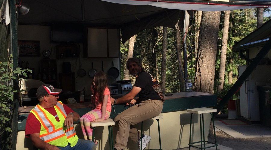 Campsites in the cedars; the volleyball court, washrooms and the Cantena, a place to hang out.