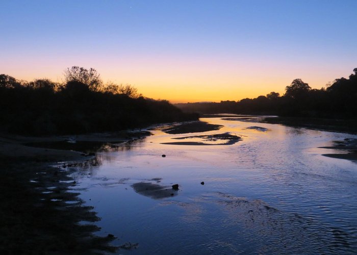 Sunset over the Sand River
