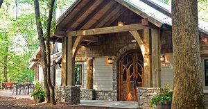 Dancing Bear Lodge in Townsend, image may contain: Porch, Housing, Cottage, Gate