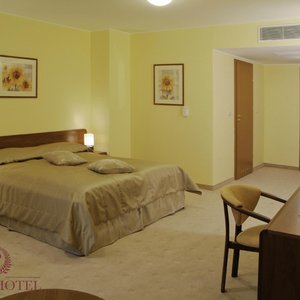 Hotel Rigga in Wladyslawowo, image may contain: Home Decor, Furniture, Corner, Bed