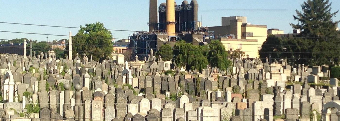 some sort of factory behind cemetery
