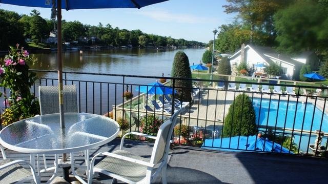 VIew of cottages and pool from deck on 2nd floor