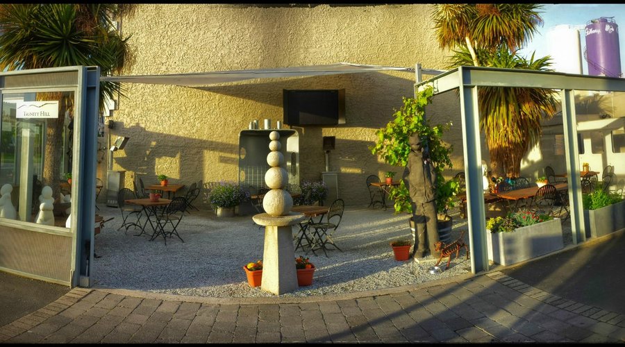Summer is almost here and the outdoor dining area is looking good!