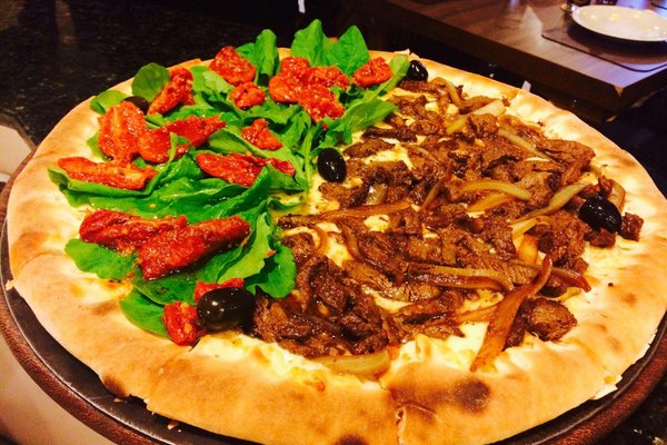 Pizza e vinho com a vista mais bonita de Itajaí de praia de Cabeçudas