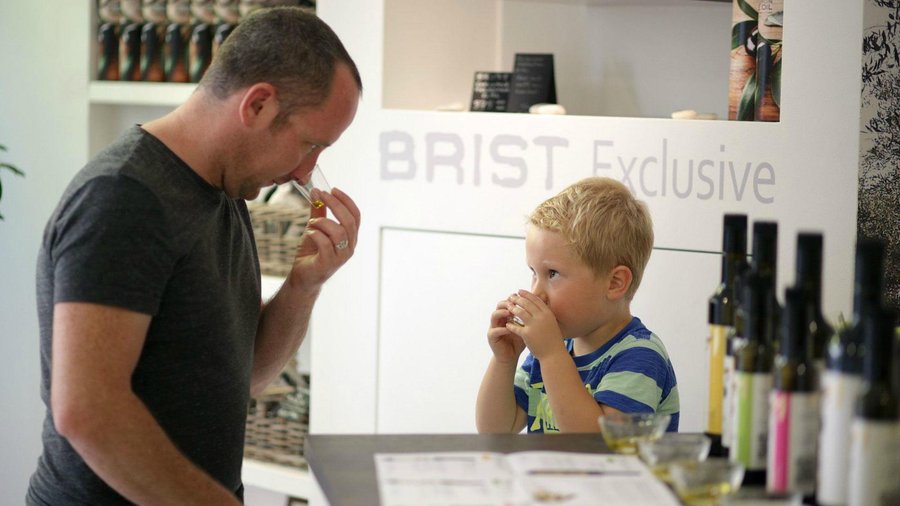 Paul and Liam tasting extra virgin olive oil