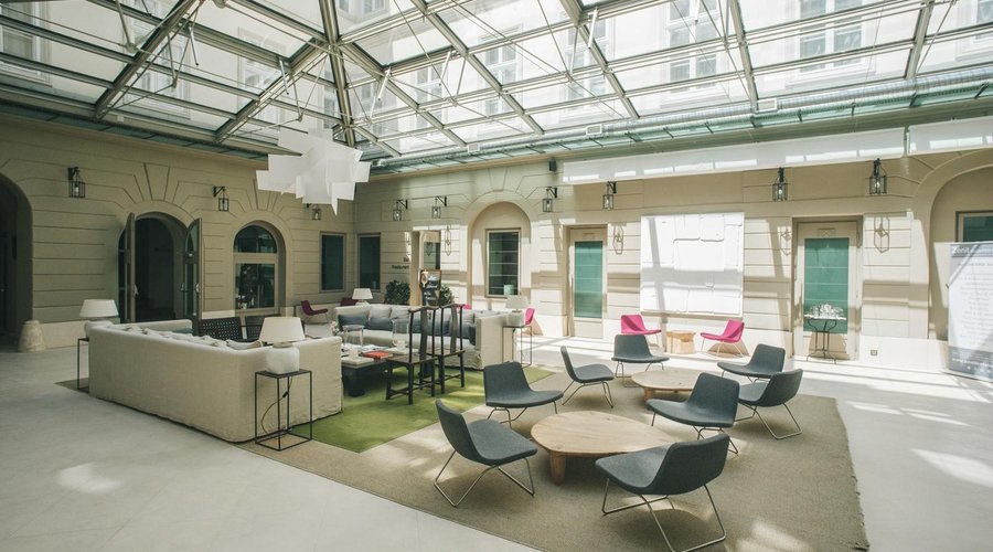 Lobby with a sitting area offering international newspapers and WiFi