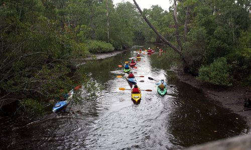 Kayaking group as seen from the covered bridge