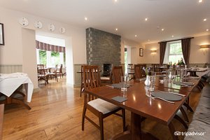 The Cottage in the Wood in Braithwaite, image may contain: Dining Room, Dining Table, Table, Flooring