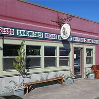 The side of the store showing the sign