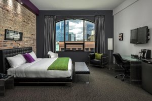 Hotel Metro in London, image may contain: Monitor, Screen, Computer Hardware, Chair