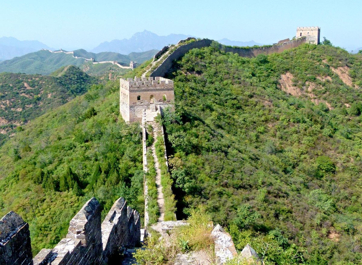 Crumbling Great Chinese Wall running down a hill, Huanghua Great Wall of  China, Great Wall