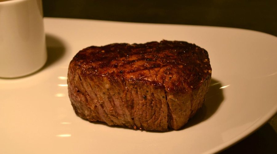 Arios serves an 8 oz Filet Migon