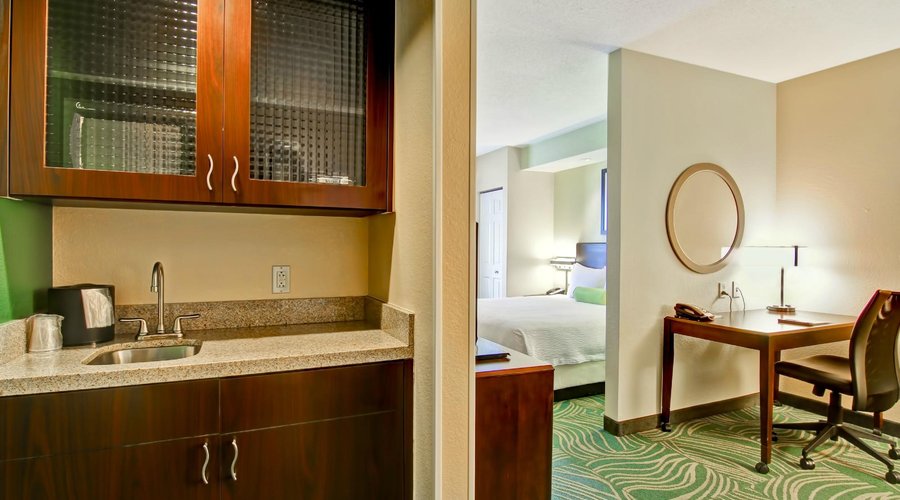 Guests can enjoy a cup of coffee or microwave meal in their very own suite.