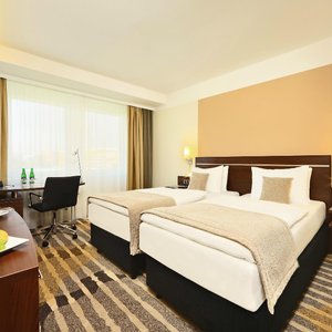 Hotel Duo in Prague, image may contain: Living Room, Screen, Monitor, Couch