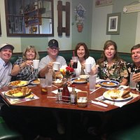 Enjoying Sat. morning breakfast in our corner booth at QC Cafe.