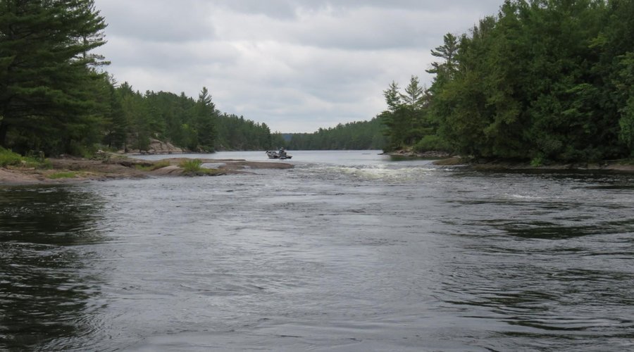 Rapids of potential fishing hole near the cottages