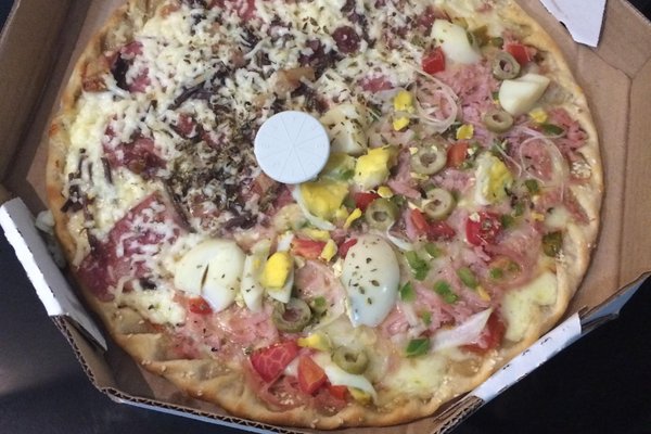 No delivery da Pizzaria Papizza o refrigerante é por conta da casa