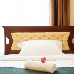 Samnang Laor Phnom Penh Hotel in Phnom Penh, image may contain: Cushion, Home Decor, Pillow, Furniture
