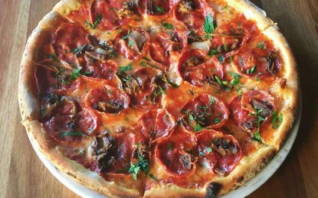 Tomato, mozzarella, salami and porcini.