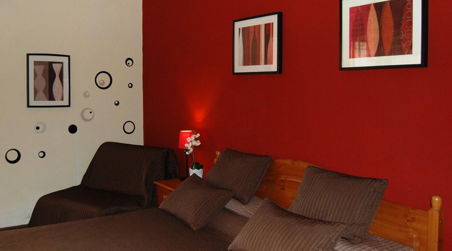 Camera Tripla letto matrimoniale
