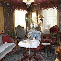 A parlor representative of the 1880s.