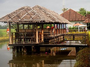 Citrus Retreats Alleppey in Alappuzha, image may contain: Shelter, Outdoors, Person, Hut
