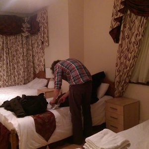 two single, one double bed room