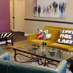 Seating in our lobby is bright and fun
