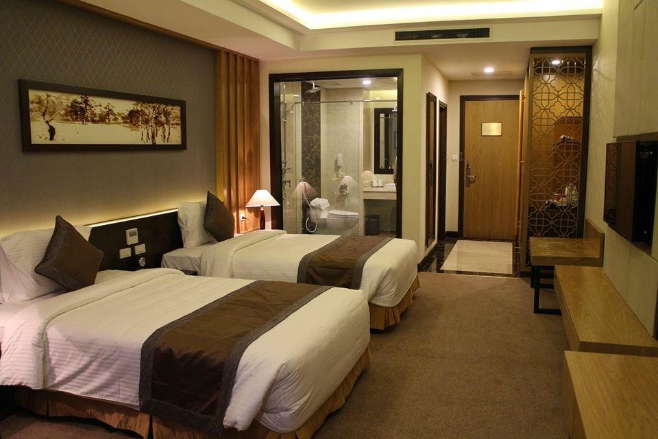 Muong Thanh Luxury Nhat Le Hotel - hotel rooms