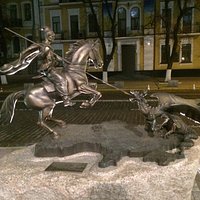 Ukrainian Kozak spears a two-headed dragon