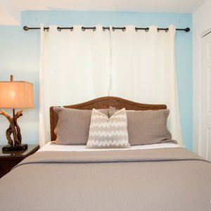 Pearl Beach Inn in Englewood, image may contain: Cushion, Home Decor, Lamp, Table Lamp