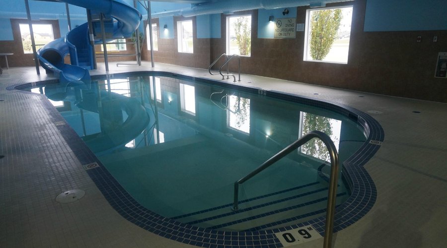 Water slide and swimming pool
