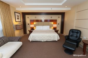 Cebu Parklane International Hotel in Cebu Island, image may contain: Furniture, Corner, Chair, Couch