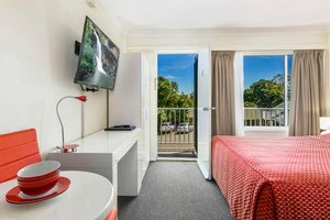 Motel 617 in Kiama, image may contain: Furniture, Monitor, Screen, Hardware