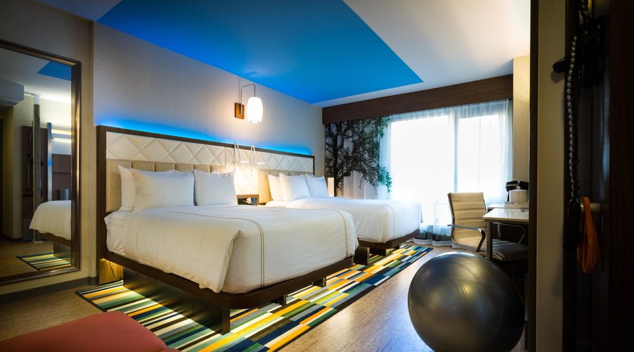 Wellness Double With Glass Enclosed Shower including in room fitness equipment and workout chann