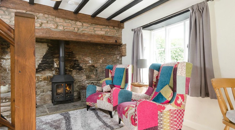 Bakehouse - Lounge area and wood burning stove.