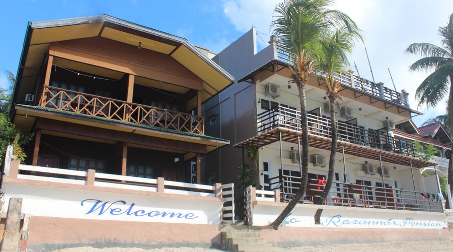 Beachfront old building (family rooms) and new building (double rooms)