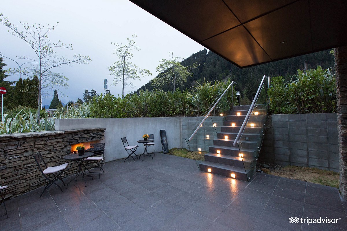 Courtyard with fireplace at the Queenstown Park Boutique Hotel