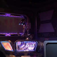 Command control droid - very chatty to guests. I couldn't honestly tell if it was live or memor