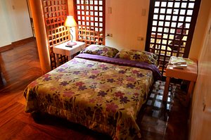 Rakdell Inn in Catanduanes, image may contain: Hotel, Resort, Bed, Furniture