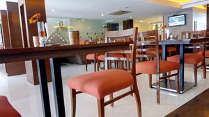 Marina Inn in Chennai (Madras), image may contain: Cafeteria, Restaurant, Dining Table, Dining Room