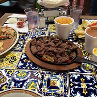 Sizzling Fajita Plate with side dishes