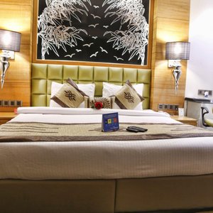 JRD Exotica in New Delhi, image may contain: Interior Design, Furniture, Bed, Chair