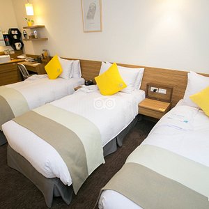 The Deluxe Triple Room (Single Beds) at the Bee House - Taipei Station Branch