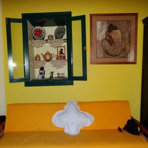 The couch and wall niche shelf