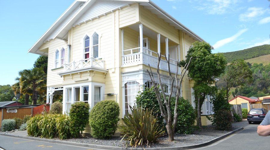 Hostel located behind apartments