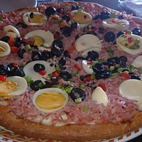 A la rica pizza y la enorme ensalada ;)
