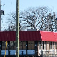 This Big Boy Restaurant overlooks the river & Needs a Dad & Mom